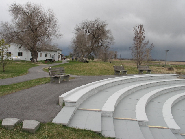 picture showing The amphitheatre located near the visitors center features benches with back supports and plenty of room for wheelchair seating.